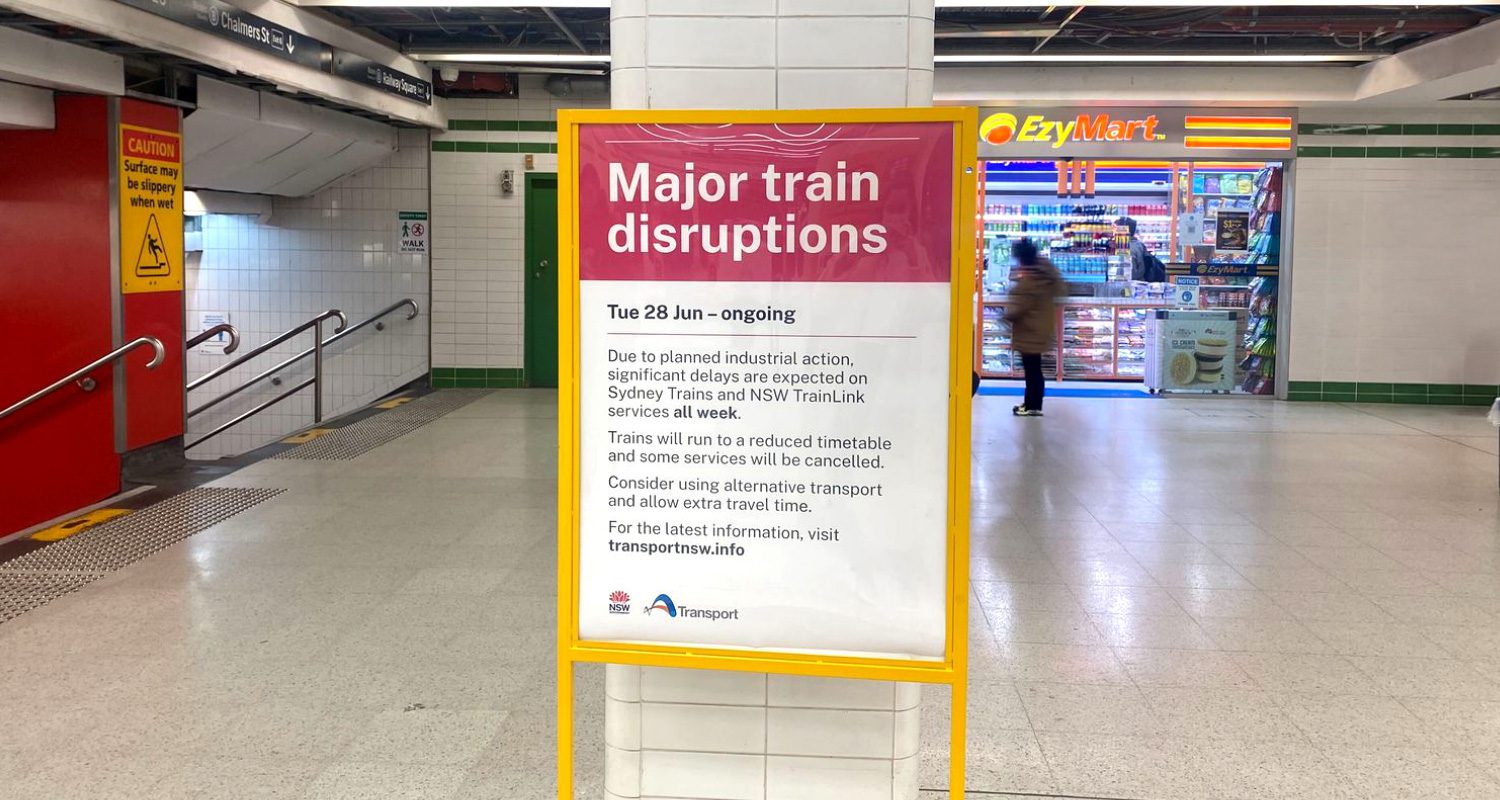 Photograph of a Transport for NSW operational template displayed on a poster at a Sydney Train station.