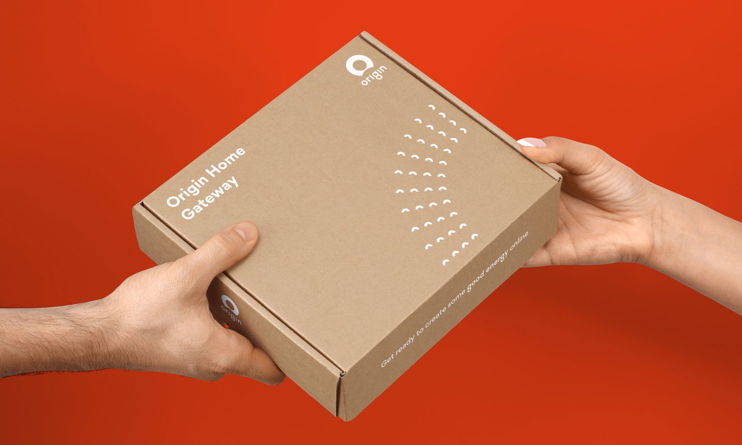 Photograph of Origin Energy packaging design featuring a modern, sleek box with bold typography and a clean, minimalist layout, displayed against a neutral background.
